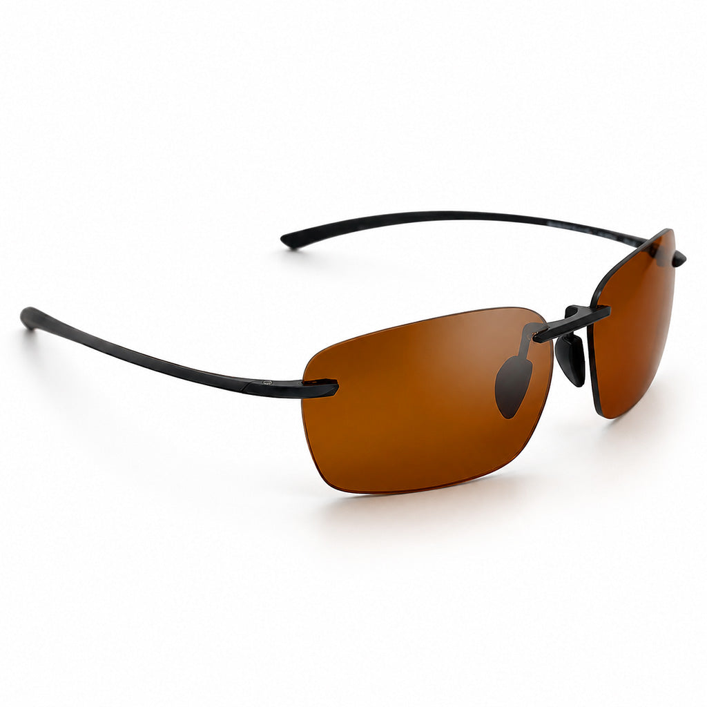 Sunglasses with brown lenses and black frames on a white background