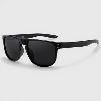 Black sunglasses with dark lenses on a light gray background