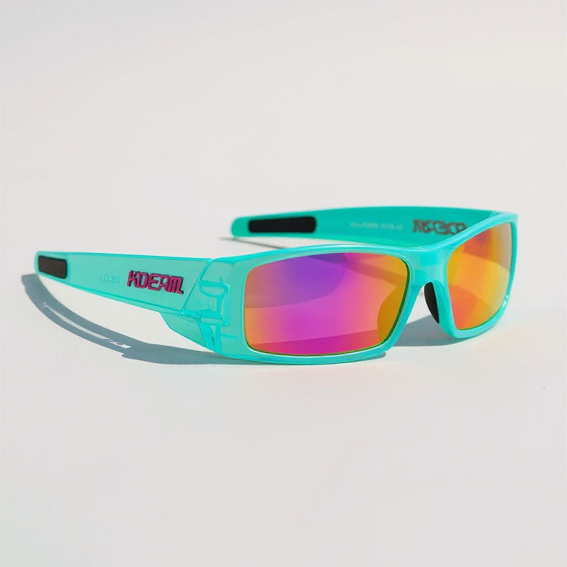 Turquoise sunglasses with colorful lenses on a light gray background