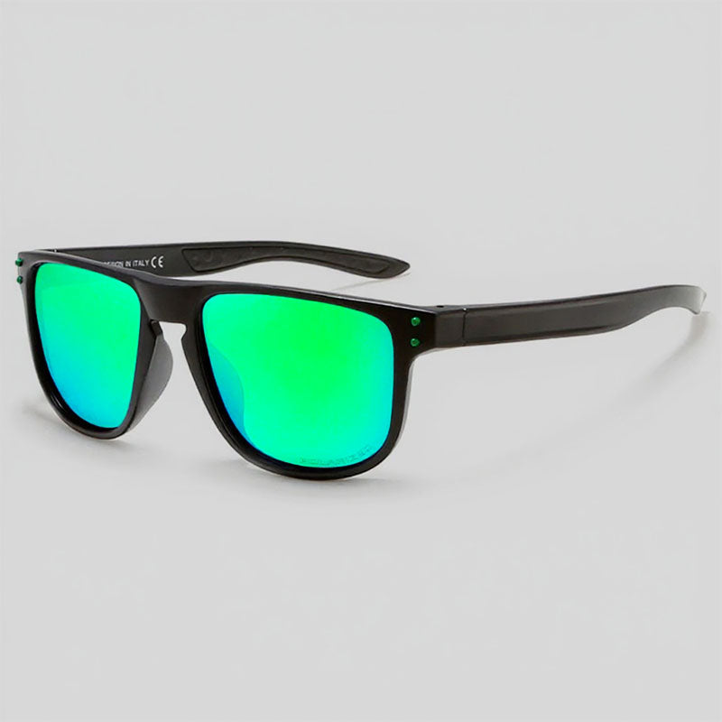 Sunglasses with green lenses and black frames on a light gray background