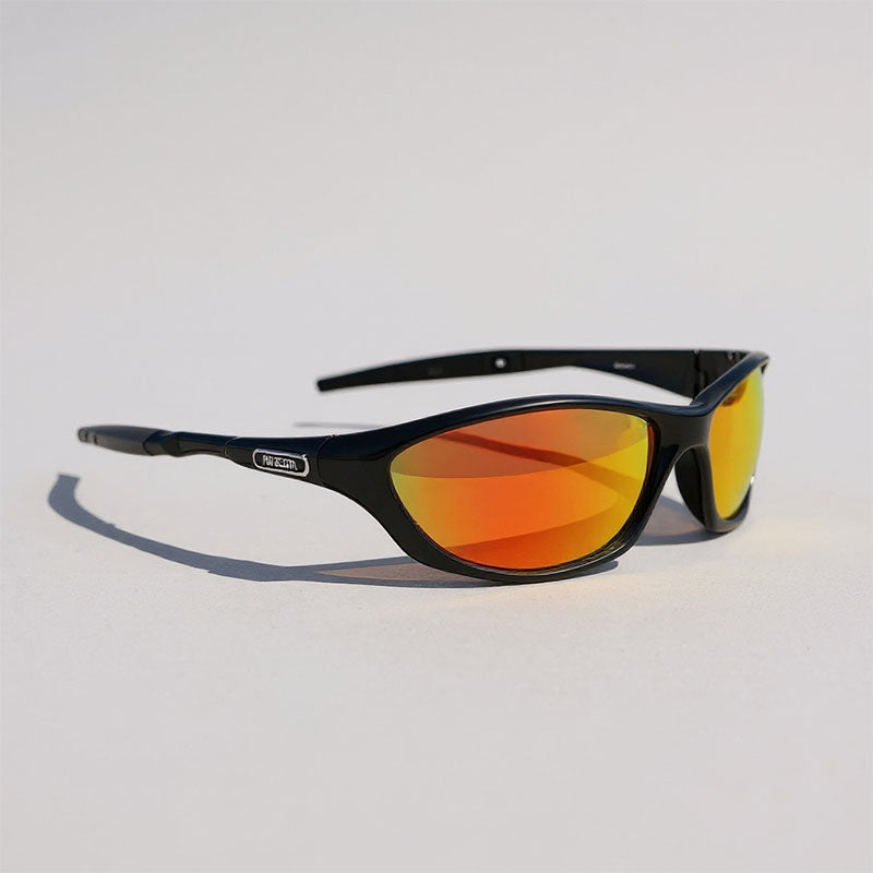 Black sunglasses with orange-tinted lenses on a light gray background